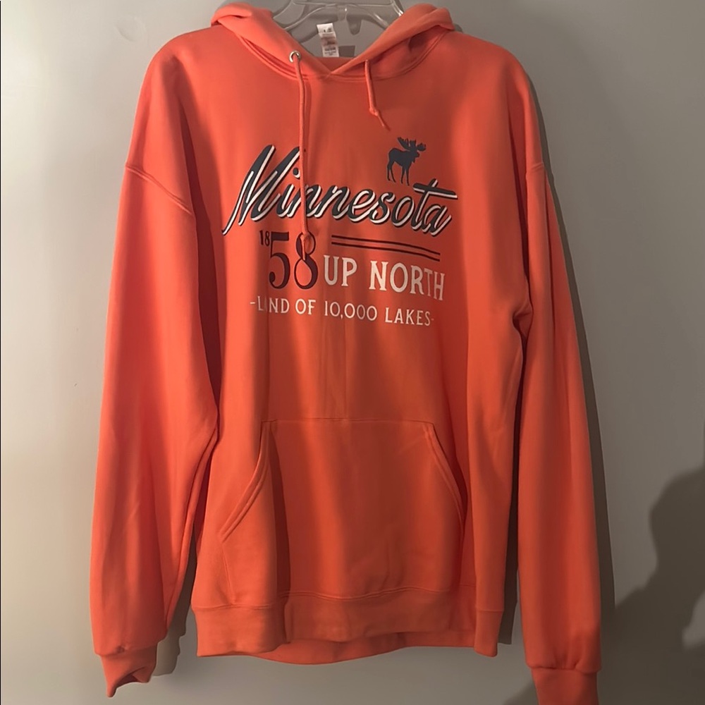 Orange Hoodie with Graphic Print